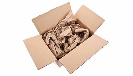 Cardboard box filled with packing paper